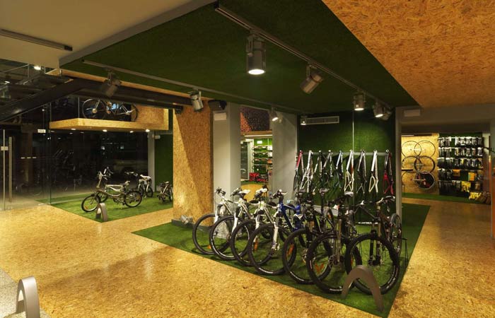 綠色天然草坪自行車店loft裝修設計案例效果圖