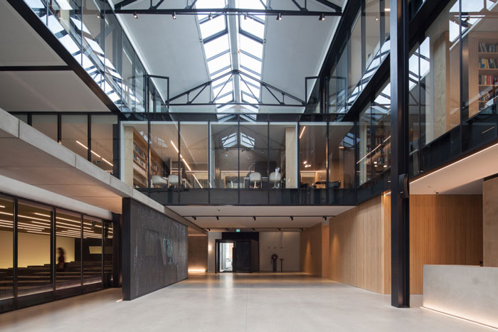 舊倉庫辦公室前臺大廳改造裝修設(shè)計(jì)效果圖