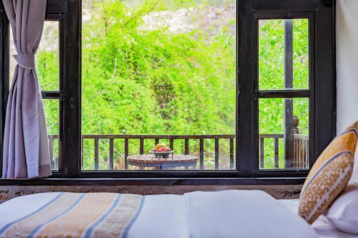 古鎮(zhèn)民宿客房裝修設(shè)計效果圖