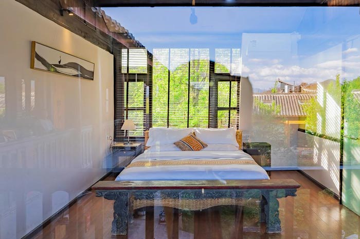 古鎮(zhèn)民宿客房裝修設(shè)計效果圖